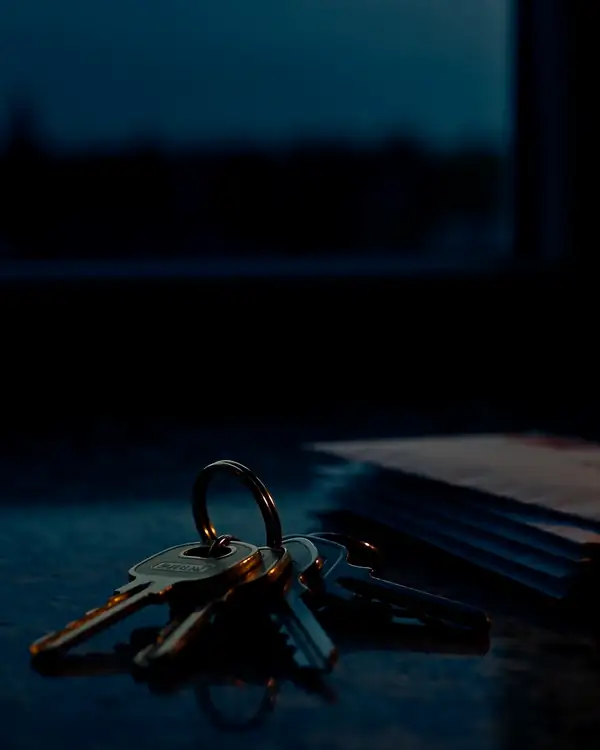 Keys by a window at dusk